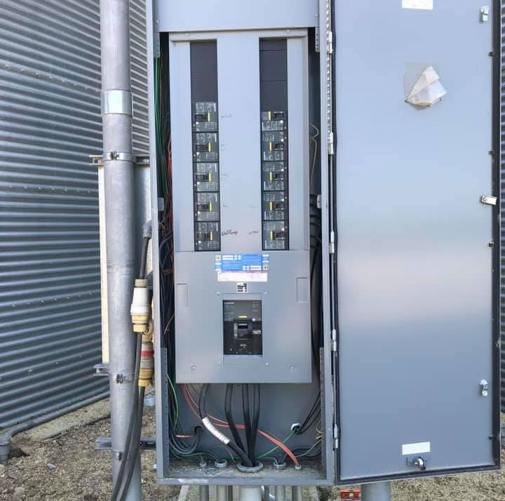 Electric box connected to a grain bin.